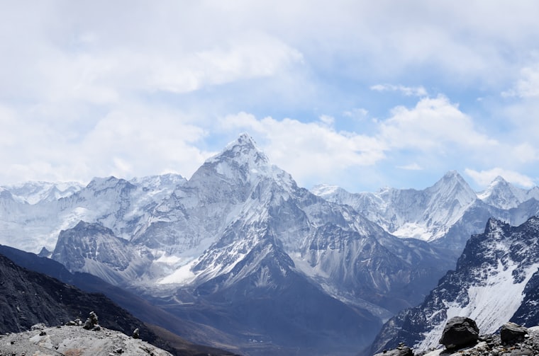 Snow-capped peaks above a high alpine valley